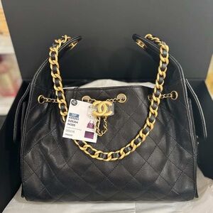 CHANEL 25 Caviar Black Quilted Leather Shoulder Bag with Gold Chain Trim
